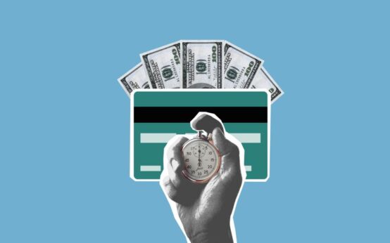Cut out paper composition of stopwatch in hand of man waiting for money credited to credit card on blue background